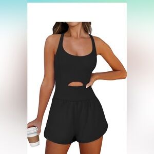 Black shorts romper with front cutout. Size medium. Never worn.